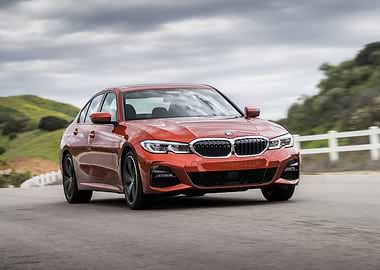 Red BMW 3 Series on Road