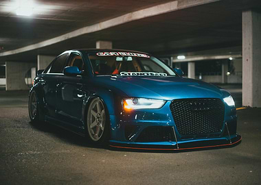 Customized Blue Audi in Parking Garage