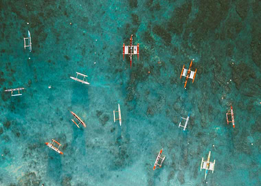 Aerial view of boats in turquoise water