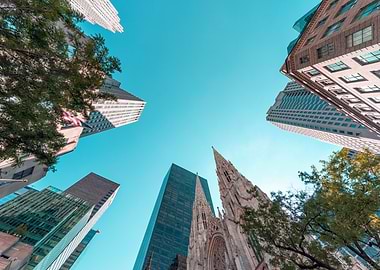 Skyscrapers and Cathedral against Blue Sky