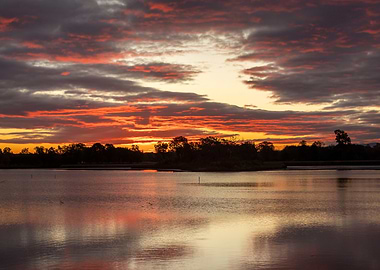 Lake at Sunset with Dramatic Sky