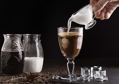Iced Coffee with Milk Pouring