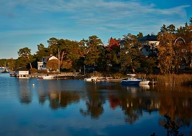 Scenic Lake with Boats and Houses