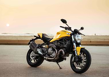Yellow Ducati Motorcycle on Beach