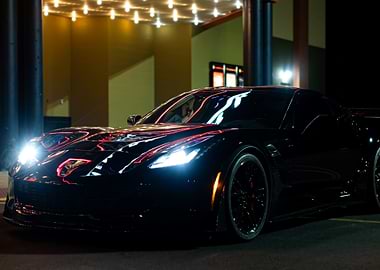 Sleek Black C7 z06 Corvette at Night