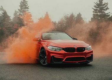 Red BMW with Orange Smoke