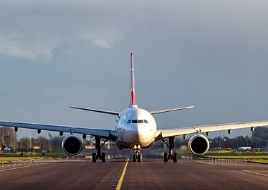 Airplane on runway, front view