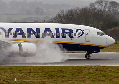 Ryanair plane on wet runway
