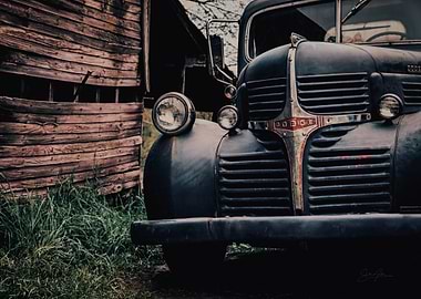 Vintage Dodge Truck Parked by Weathered Old Barn