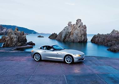 Silver BMW Z4 Roadster by the sea
