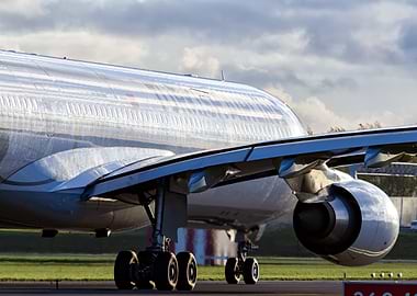 Silver Airplane Close-Up on Runway
