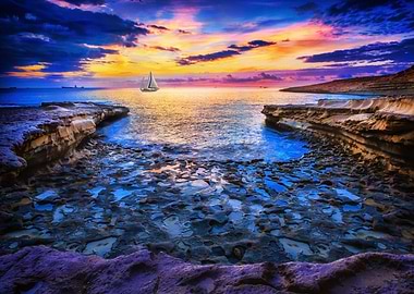 Sailboat at Sunset by Rocky Shore in Malta