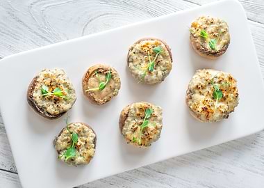Stuffedwith blue cheese Mushrooms on White Plate