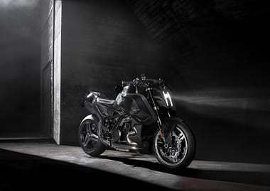 Sleek Black Motorcycle in Dark Setting