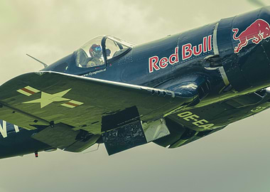 Red Bull Corsair Airplane in Flight