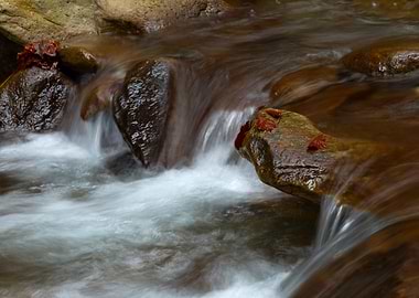 Water flowing over rocks in stream