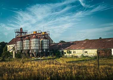 Rural Farm with Silos and Barn