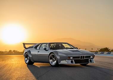 Gray BMW M1 at Sunset