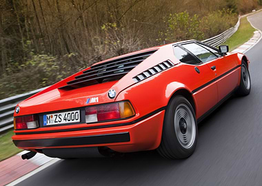 Red BMW M1 on Racetrack