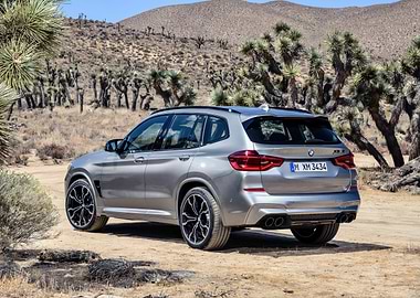 Silver BMW X3 in Desert Landscape