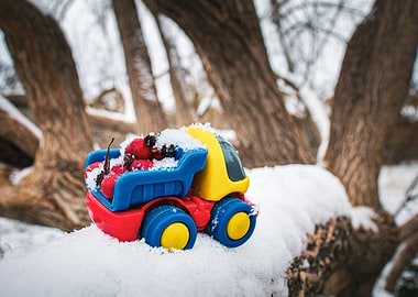 Toy truck in winter landscape