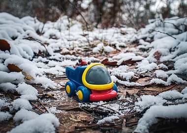 Toy truck in snowy landscape