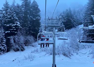 Ski lift in Alaska snowy mountain landscape