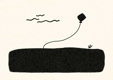 Kite flying over a dark field