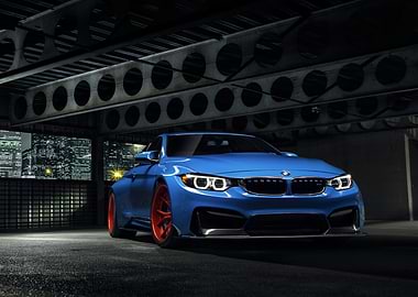 Blue BMW M4 with Orange Wheels