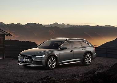 Gray Audi A6 Allroad in Mountains