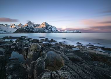 Snowy Mountains and Rocky Coastline