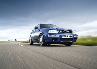 Blue Audi RS2 on the road