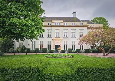 Elegant Mansion with Lush Greenery