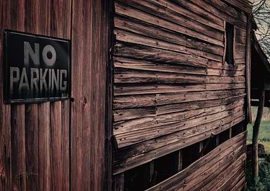 Rustic Barn with 'No Parking' Sign