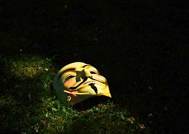 Guy Fawkes mask on grass