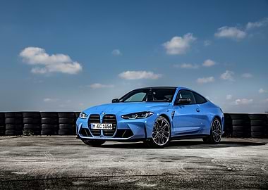 Blue BMW M4 Coupe on Track