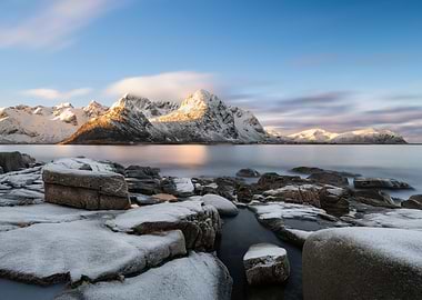 Snowy Mountains and Rocky Coastline
