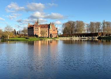 Egeskov Castle reflected in water