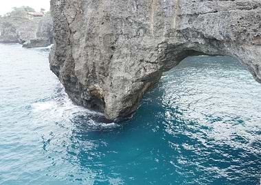 Rock Arch Over Blue Ocean Water Nusa Penida