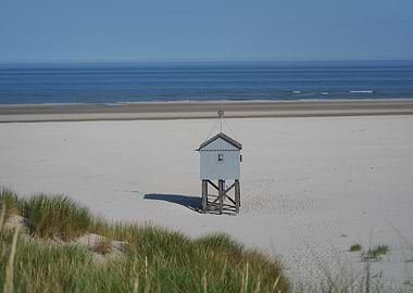 Beach hut on a sandy beach