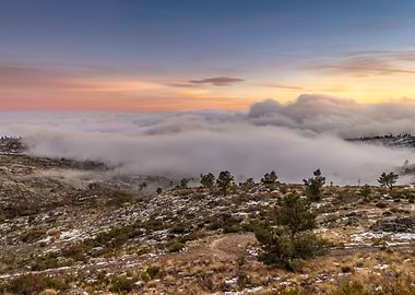 Mountain landscape with clouds at sunset