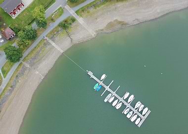 Aerial view of a lake with boats