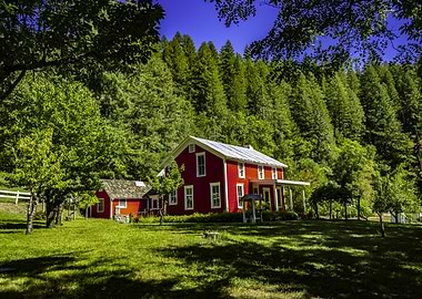 Red Farmhouse in Green Landscape
