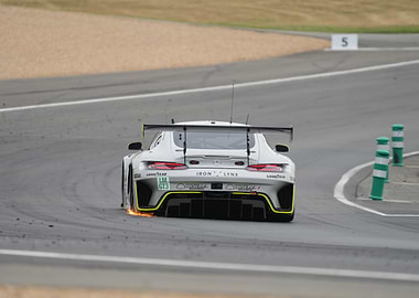 White Race Car on Track with Flames