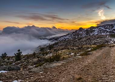 Mountain landscape with clouds and snow