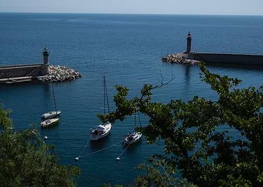 Coastal View with Lighthouses and Boats