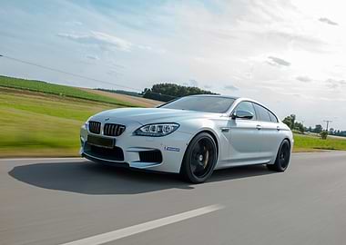 Silver BMW M6 Gran Coupe on Road