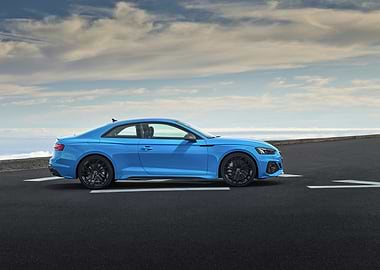 Blue Audi RS5 Coupe on Road