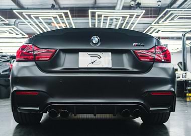 Matte Black BMW M4 Rear View