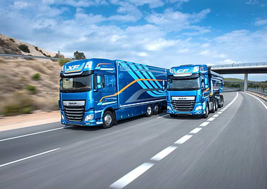 Two Blue DAF Trucks on Highway